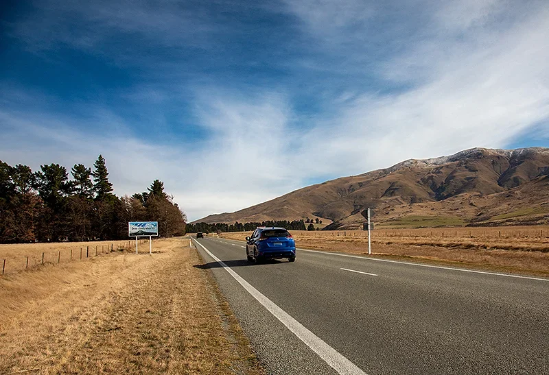 Car driving on a road - MAS Vehicle Insurance