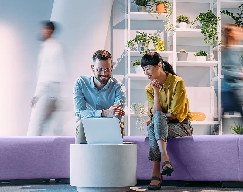 Two people looking at a computer meeting - page copy3webp